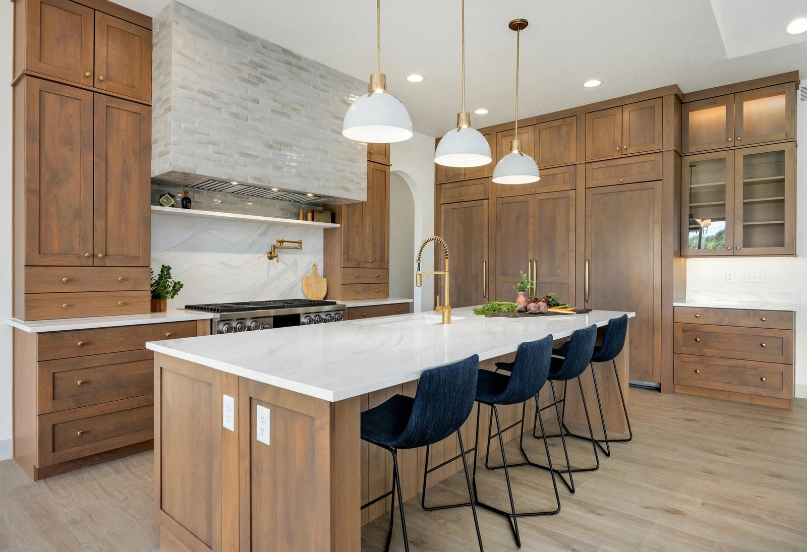 Kitchen Remodeling brown natural cabinets and white granite