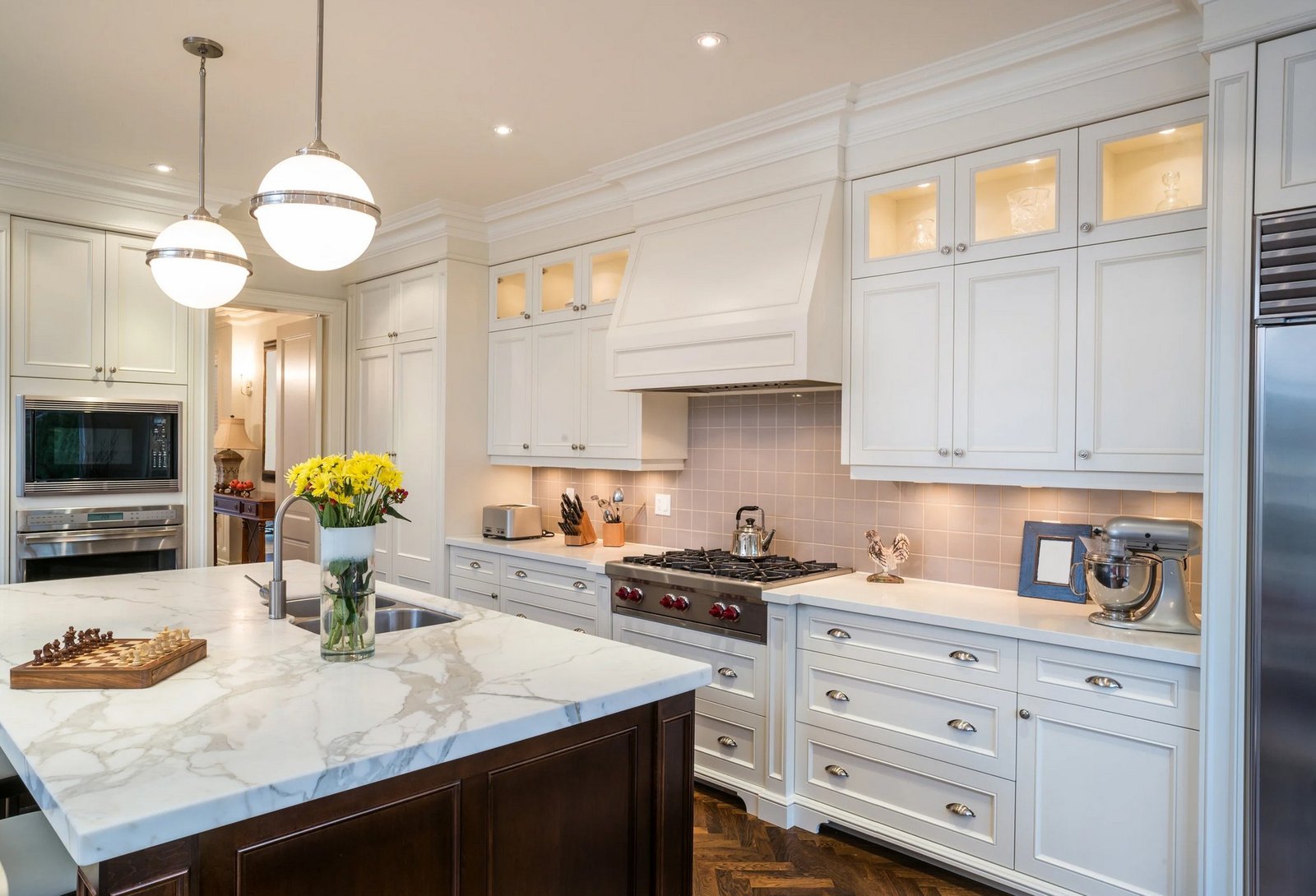 Kitchen Remodeling cream cabinets with a white granite 2
